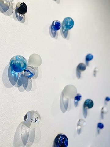 hand blown glass spheres orbs blues wall art installation glass sculpture