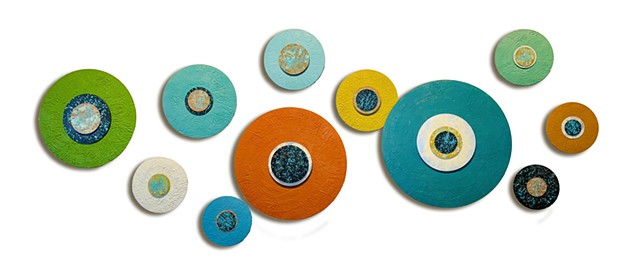 Circle encaustic metallic paintings wall art installation colorful mid-century modern palette