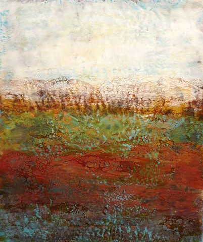 Copper leaf highlights this encaustic abstract landscape in reds, golds and greens