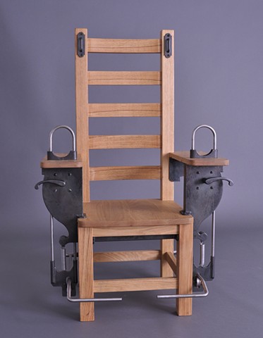 Chair with self activated hand cuffs