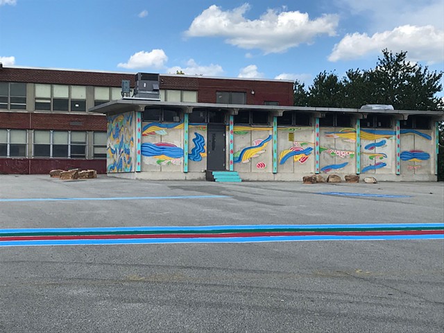 View of exterior mural at public school in Philadelphia, PA
