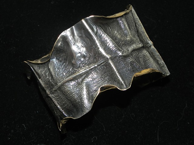 Reticulated 1/10 silver plated brass, Fold formed.