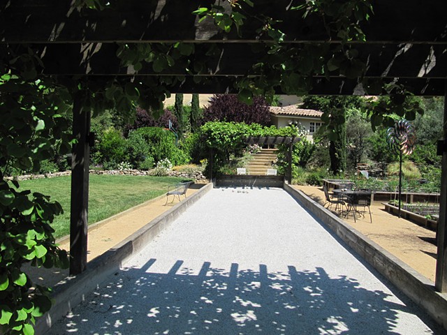 Boce court with steps to guest house beyond