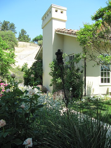 Portion of living room and rose garden