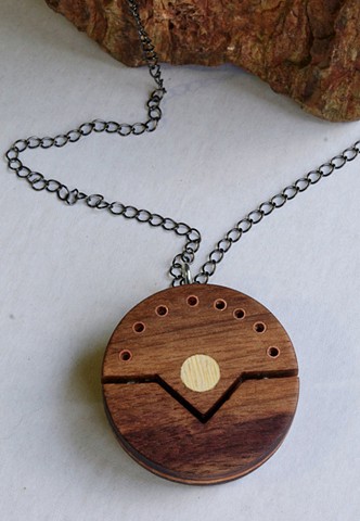 Round Wooden Pendant handcrafted with Recycled Wood and Copper tubing.