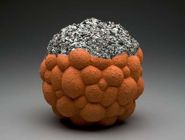Ceramic sculpture: orange bubble cloud with crust fused with glaze