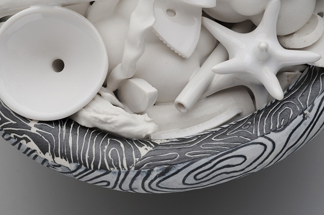 detail of black and white bowl with white contents