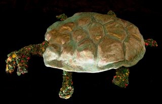 ceramic turtle and crocheted body