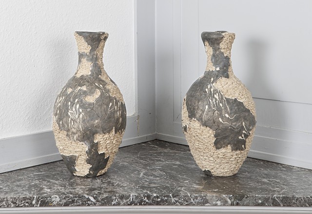 Clay vases with swimming sperm detail by artist Paul March entitled Possible Fertility Symbol 