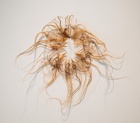 hair sculpture, stitched endangered snails