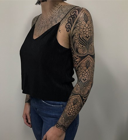 Ornamental floral pattern and blackwork sleeve by Alvaro Flores Tattooer from La Flor Sagrada Tattoo Melbourne Australia