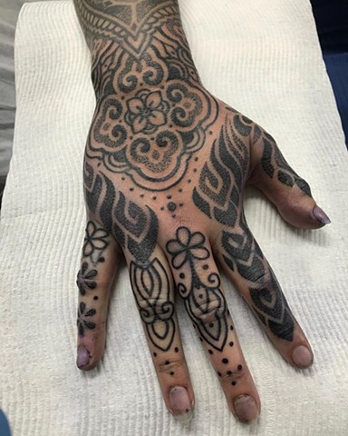 Thai style hand tattoo by Alvaro Flores Tattooer at La Flor Sagrada Tattoo Melbourne 