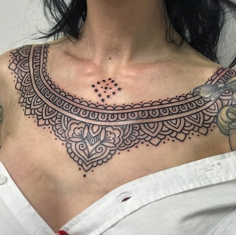 Ornamental collar chest pattern by Alvaro Flores Tattooer from La Flor Sagrada Tattoo Melbourne Australia