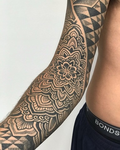Mandala geometric pattern sleeve by Alvaro Flores Tattooer at La Flor Sagrada Tattoo Melbourne