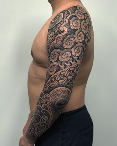 Japanese and geometric mixed patterns done by Alvaro Flores Tattooer at La Flor Sagrada Tattoo in Melbourne Australia
