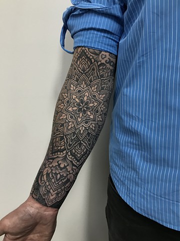 Black work floral mandala by Alvaro Flores Tattooer from La Flor Sagrada Tattoo Melbourne Australia