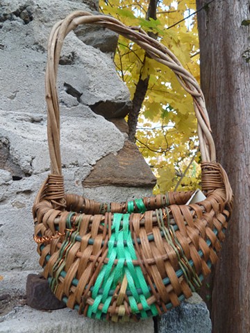  woven grapevine, copper wire, and plastic strapping ribbon 