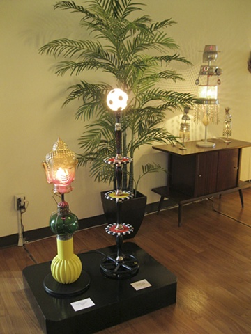 Charmaine Caire- "OHM" and "Empty Nest" artist lamps