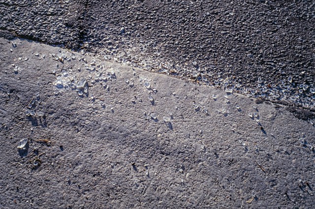 Broken Glass On Concrete
