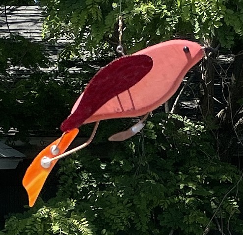 Small hanging bird sculpture. 