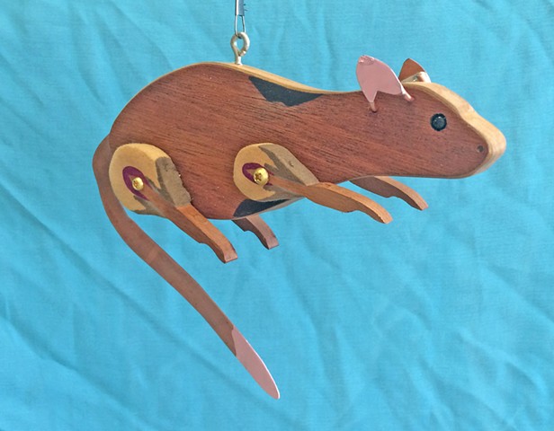 Hanging Rat Sculpture.