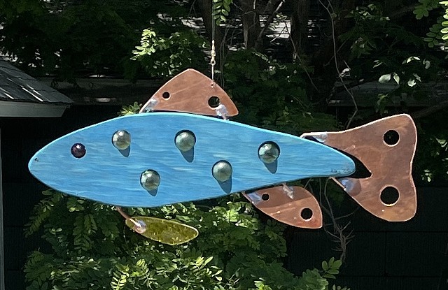 Hanging abstract trout sculpture