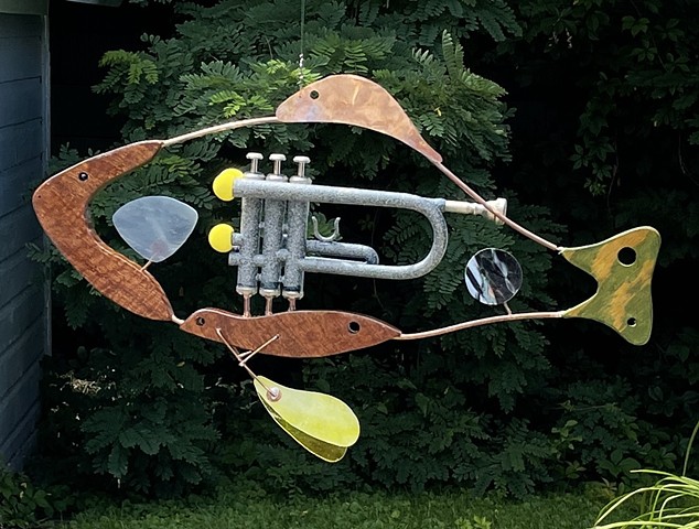 Hanging trumpet fish sculpture. 