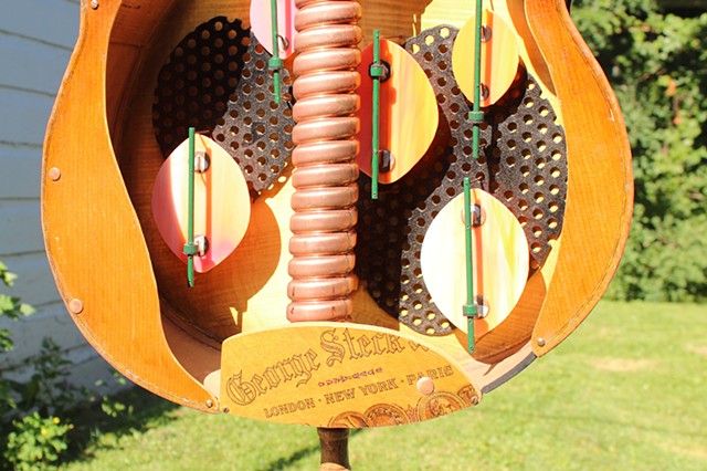 Hanging and Freestanding Sculptures from Repurposed Musical Instruments. 