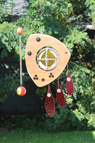 Abstract Sculpture with Red Feathers