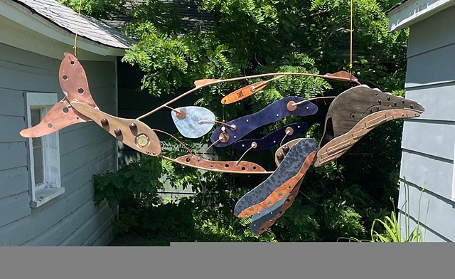 Hanging humpback whale sculpture 