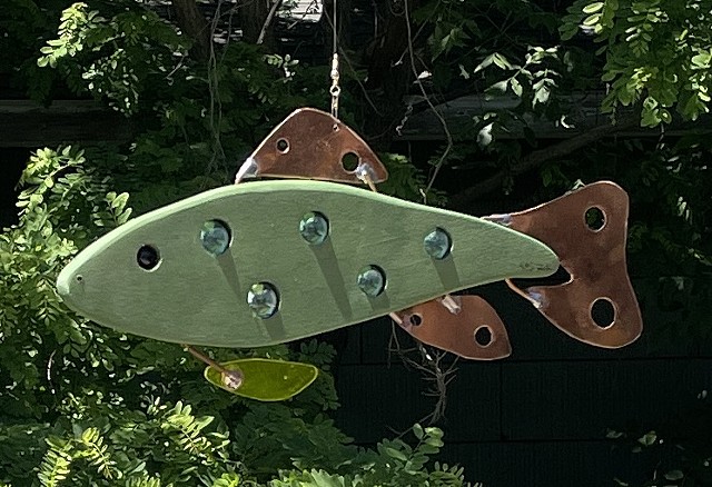 Hanging abstract trout sculpture