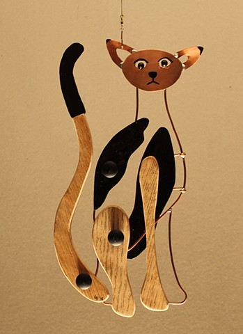 Hanging cat sculpture