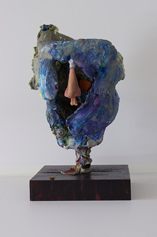 Sculpture with thistles and prosthetic eye by Lauren Levato Coyne 
