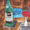 Wine bottle, glass and ashtray.