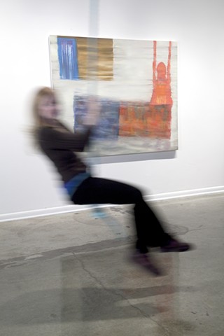 Installation view: swinging in front of "Floor Reflection..."