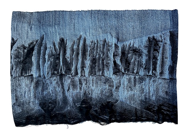 Jacquard woven Antarctic glacier manipulated to look like it is dissolving