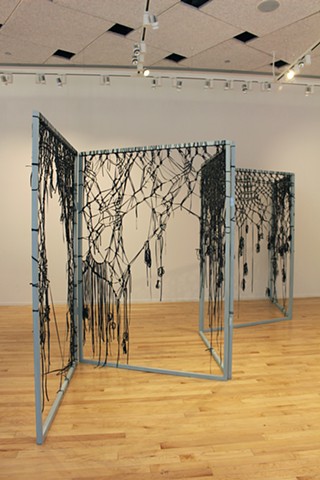 large sculptural boundary like a folding screen