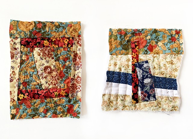 pair of rectangular quilt collages made from scrap fabric with applique