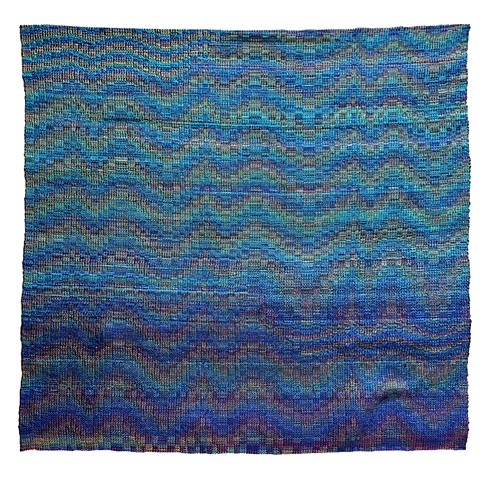 Manipulated structurally iridescent Echo woven wave forms, slowly changing from dark to light blue