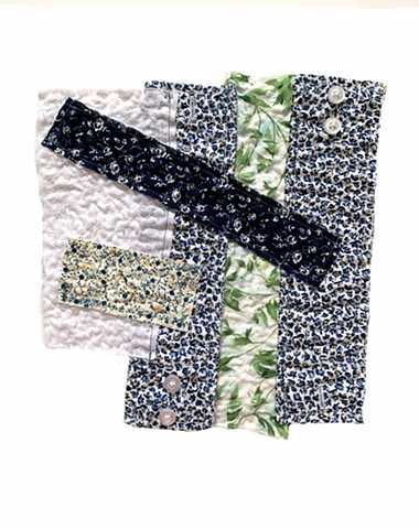 Quilt collage with blue florals background, diagonal dark blue lines across surface