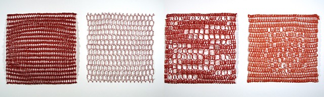 Crocheted fiberglass and polyester resin grid wall sculpture based on pi  by Yvette Kaiser Smith