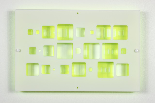 Green and white laser-cut acrylic template with geometric pattern based on pi by Yvette Kaiser Smith