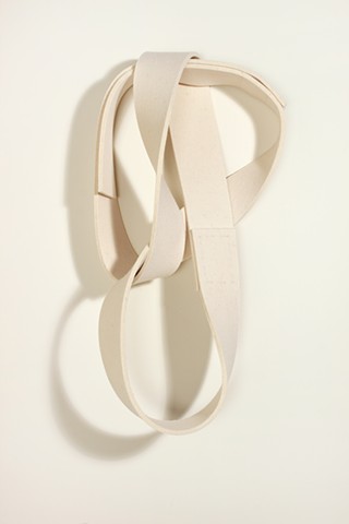 off white felt strap twisted in figure 8