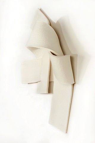 2 straps of thick off-white felt knotted together in chaotic manner