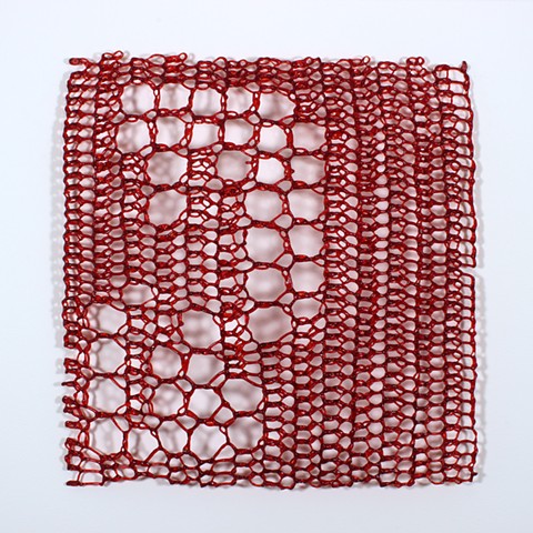 crocheted fiberglass red minimal geometric grid based on e sequence by Yvette Kaiser Smith