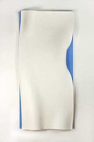 vertical organic undulating white felt revealing parts of light blue felt underneath