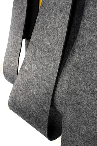 Grey synthetic felt wall sculpture by Yvette Kaiser Smith