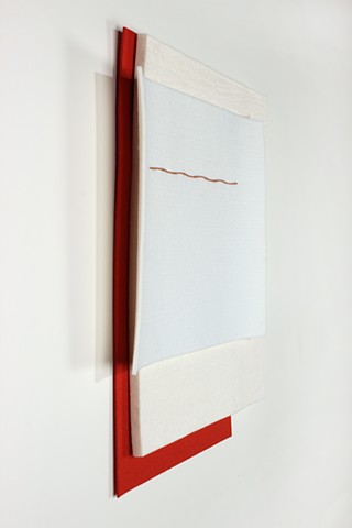 simple geometric composition in red and white felt