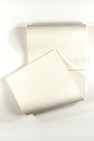 Simple folded 3D form in thick white felt