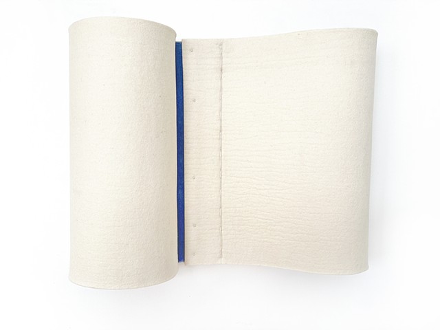Off white wall hung sculpural felt with blue stripe